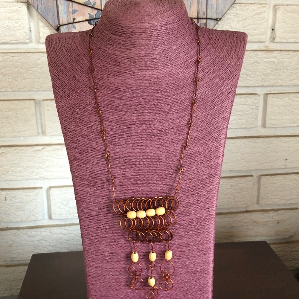 Artisan crafted copper wire necklace with wooden beads